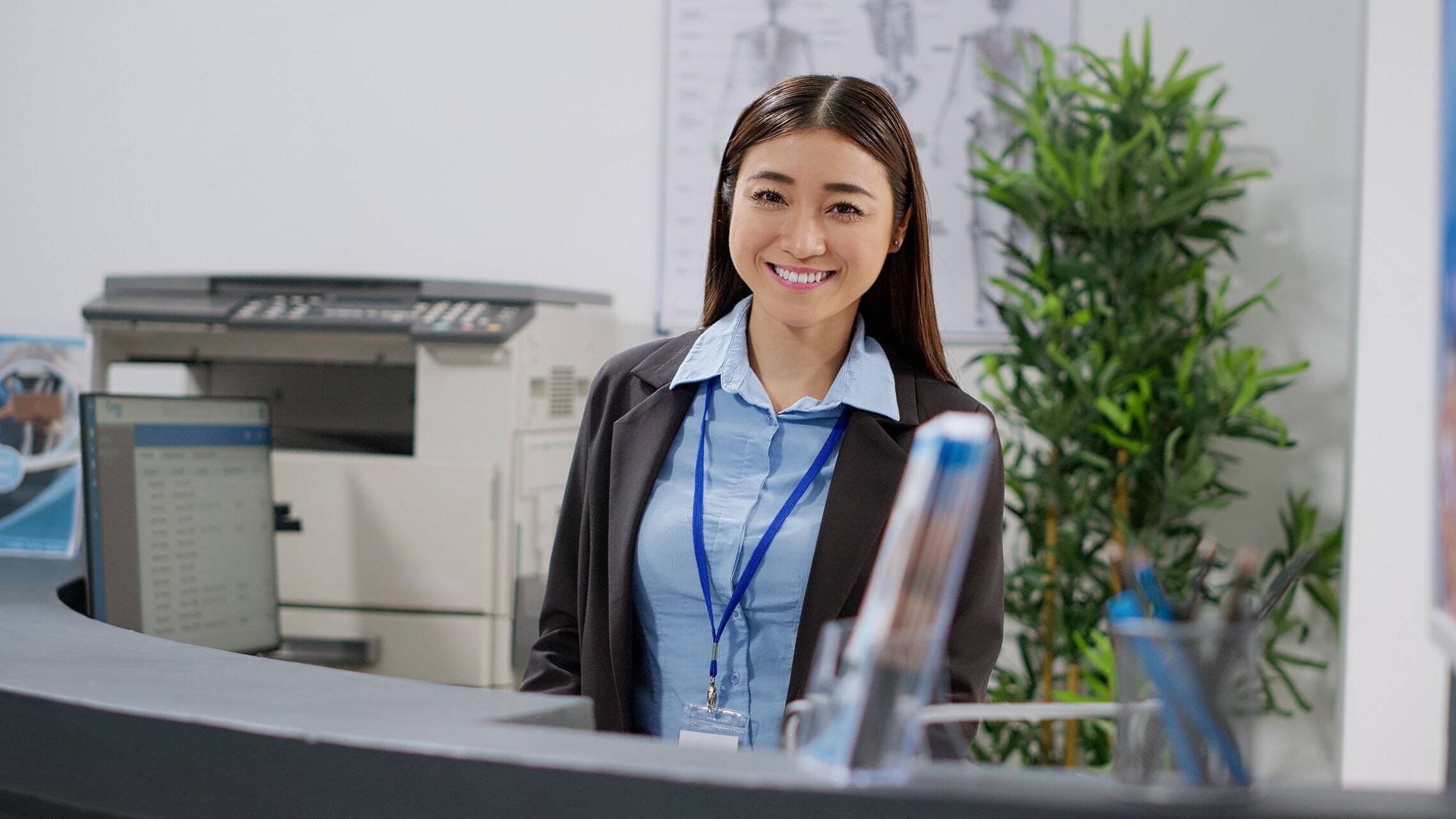 Receptionist managing outpatient clinic