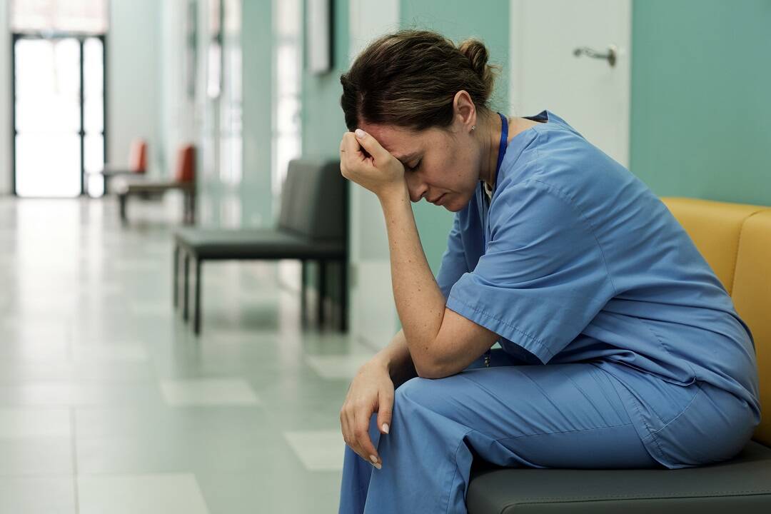 Clinic experiencing physical therapy shortage with stressed therapist