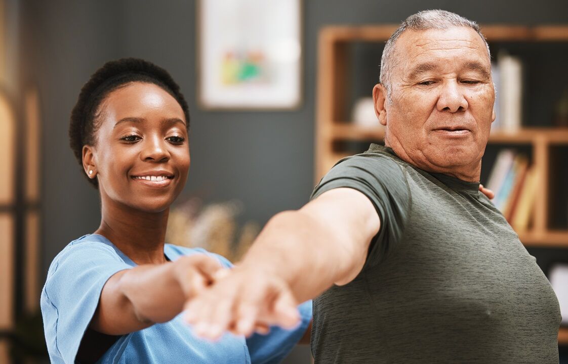 physical-therapist-applying-what-is-patient-activation-on-male-patient